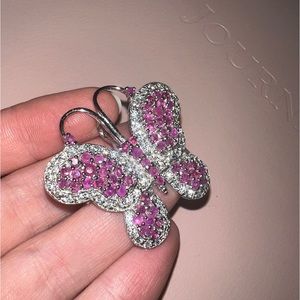 Never used before brooch with ruby colored gems, cute and a classic!